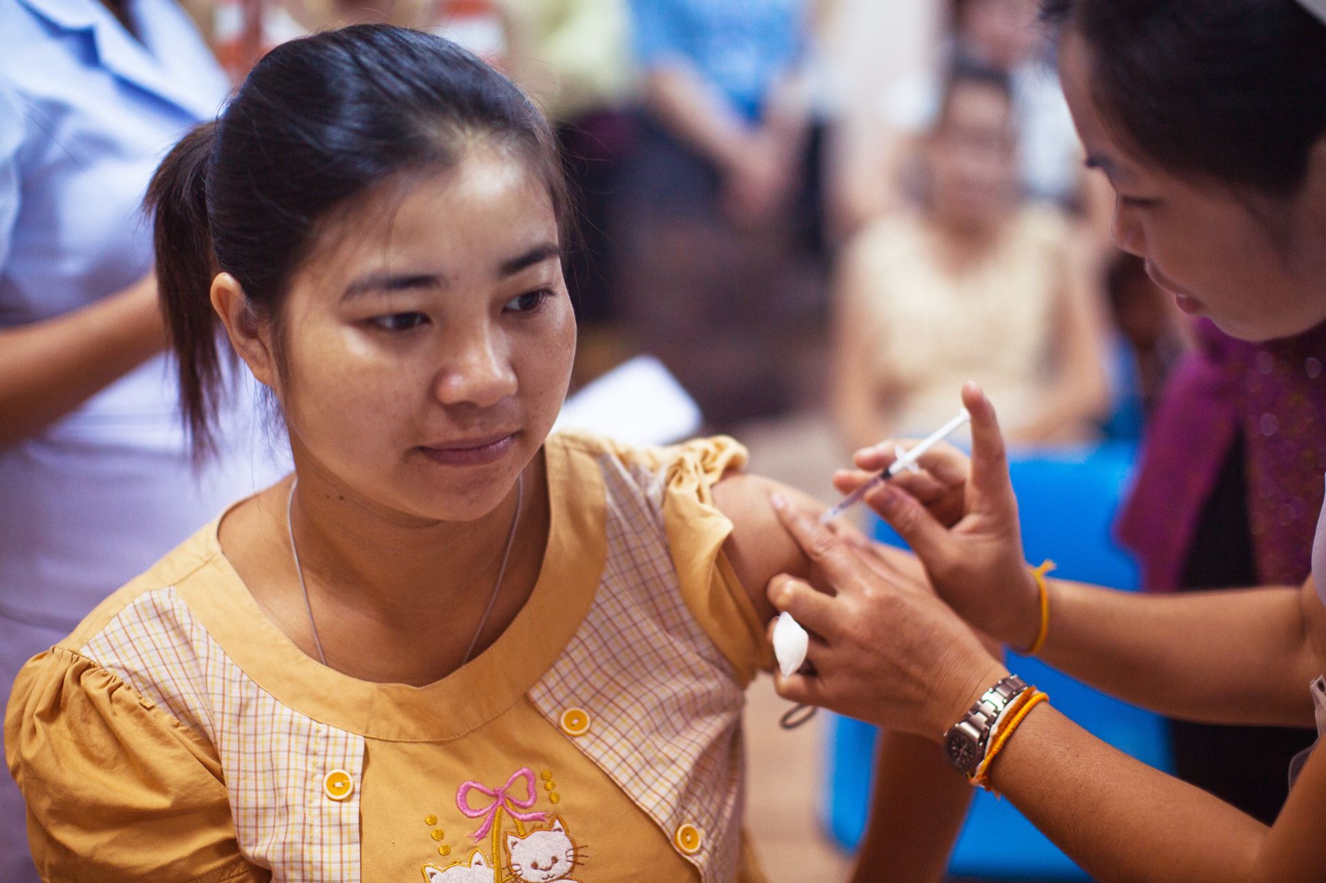 Woman being vaccinated