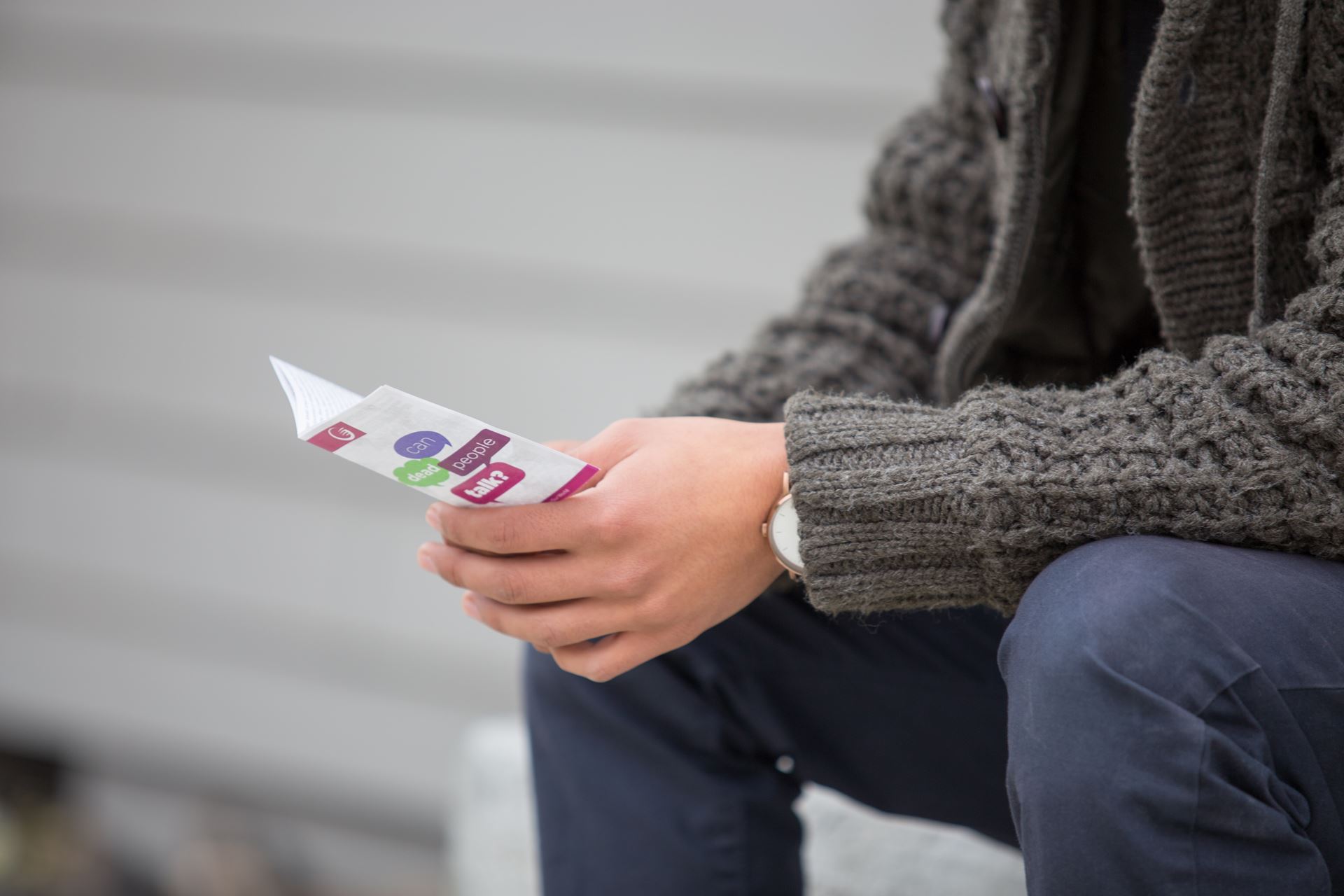 Man reading a leaflet